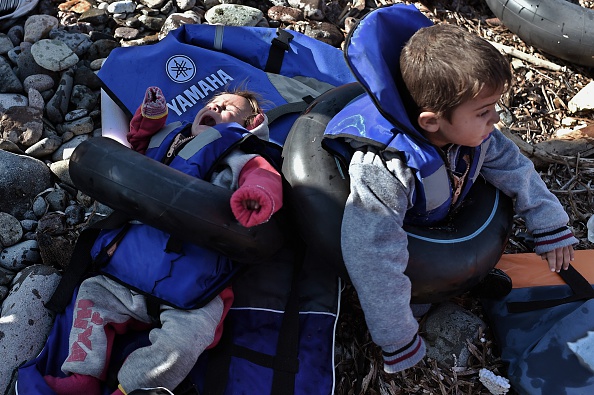 Refugees and migrants, including many children, continued to arrive Thursday on the shores of the Greek island of Lesbos after crossing the Aegean sea from Turkey. Several boats carry migrants have sunk this week.