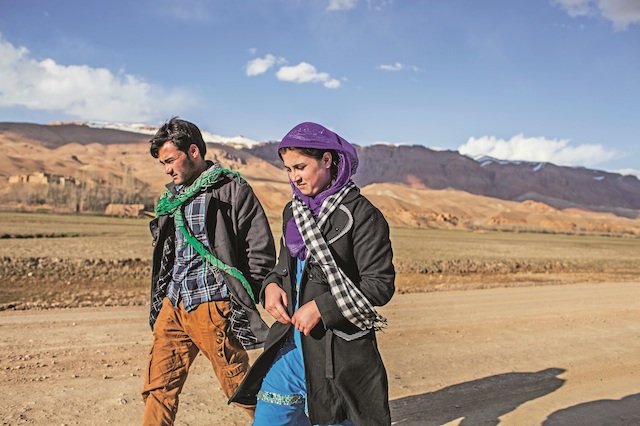 This picture of Zakia and Ali on the run, first published in <em>The New York Times</em>, has become iconic, with many Afghan artists painting versions of it.