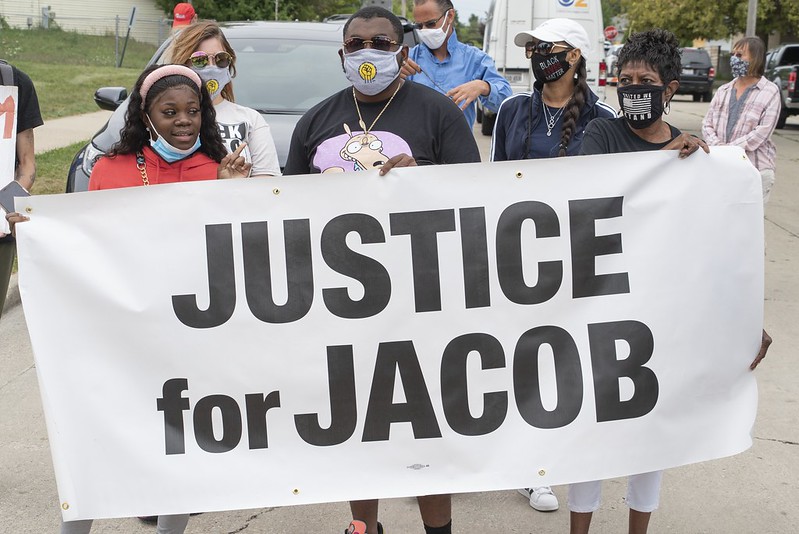 People gather last weekend at a rally for Jacob Blake, the man shot by Kenosha police on August 23. 