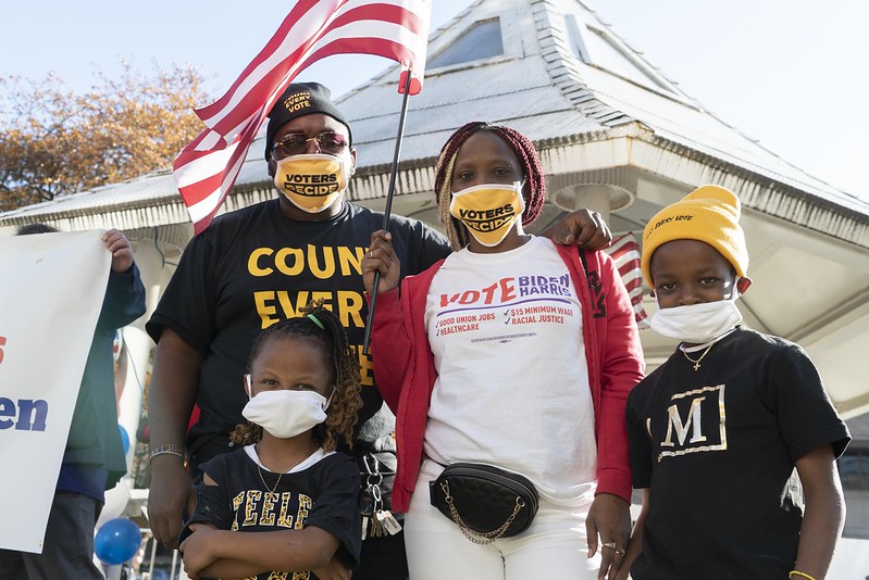 People gather at a Milwaukee Teachers' Education Association rally on November 7, 2020 in support of President-elect Joe Biden and Vice President-elect Kamala Harris. 